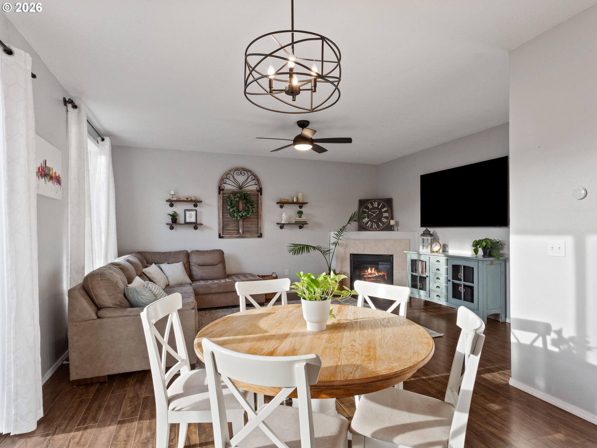 5468 J Street Washougal, WA 98671 - Photo 11 of 48 a view of a dining room with furniture wooden floor and chandelier
