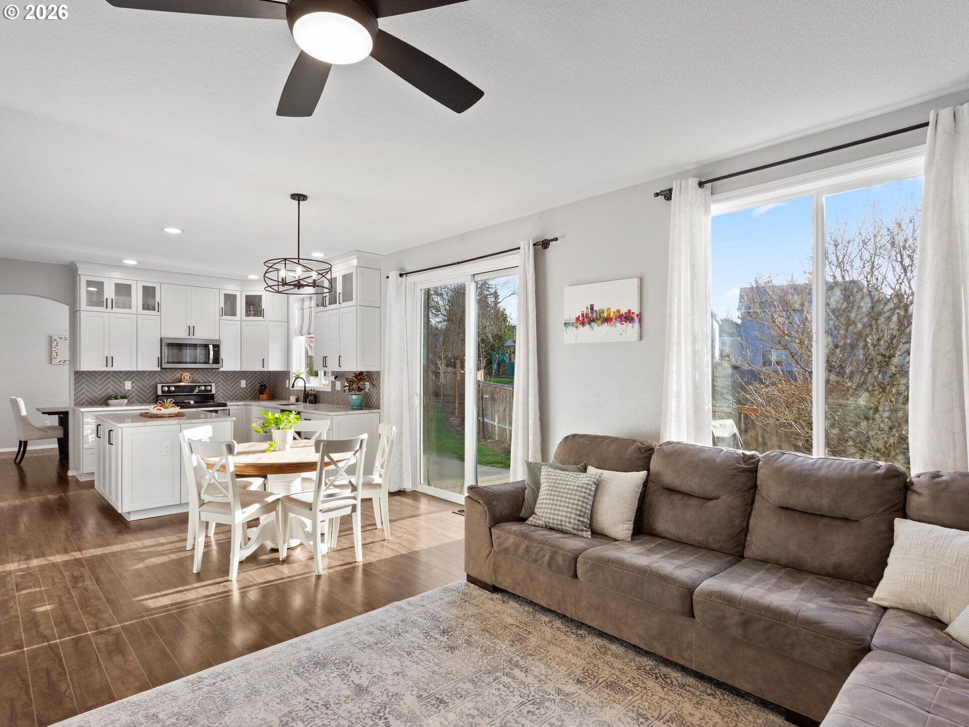 5468 J Street Washougal, WA 98671 - Photo 13 of 48 a living room with furniture and a large window