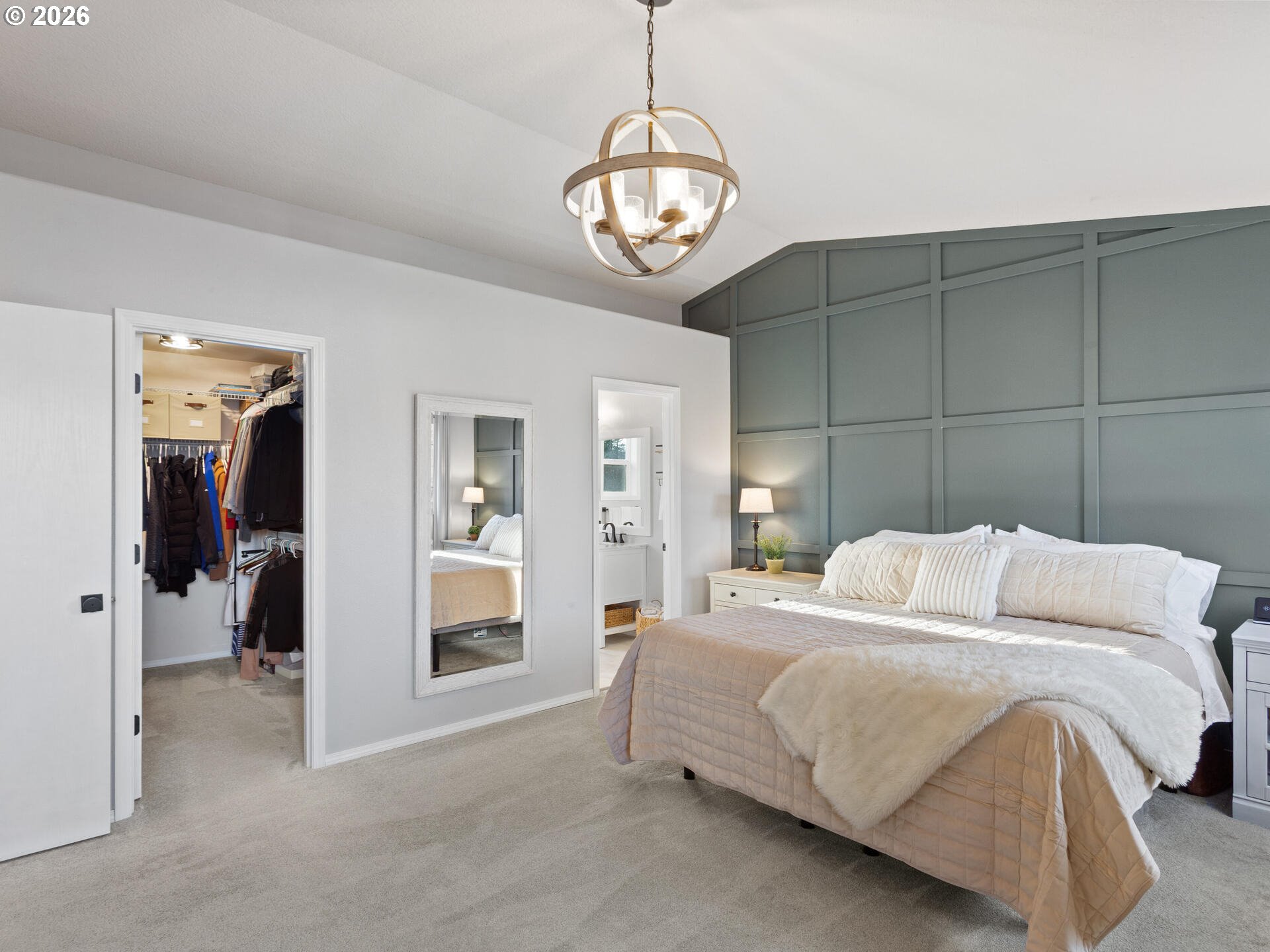 5468 J Street Washougal, WA 98671 - Photo 17 of 48 a bedroom with a bed and a chandelier