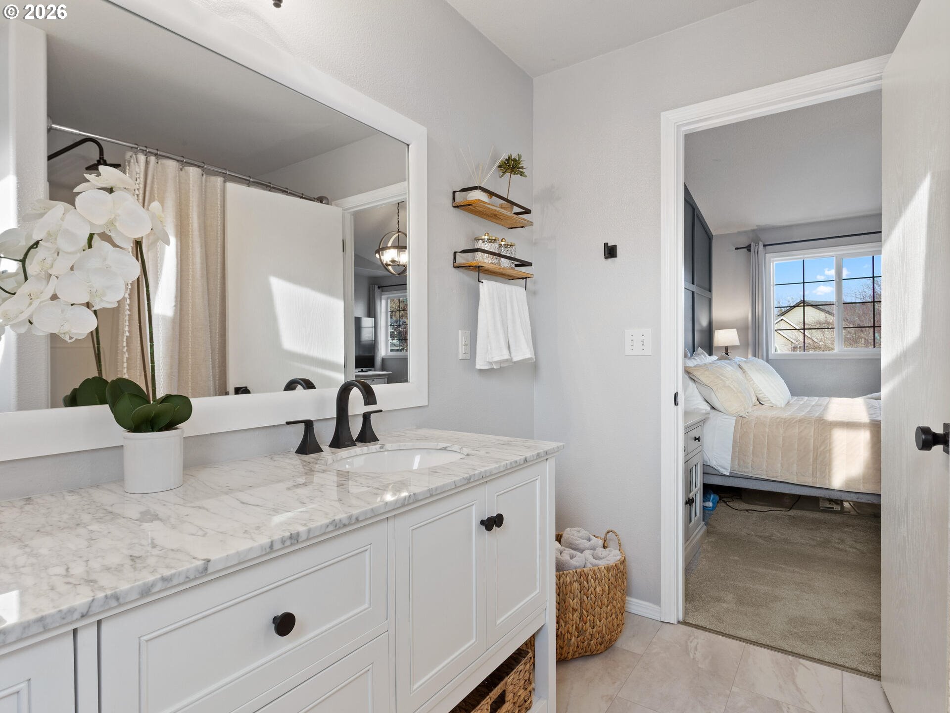 5468 J Street Washougal, WA 98671 - Photo 19 of 48 a en suite bathroom with a granite countertop sink and a mirror