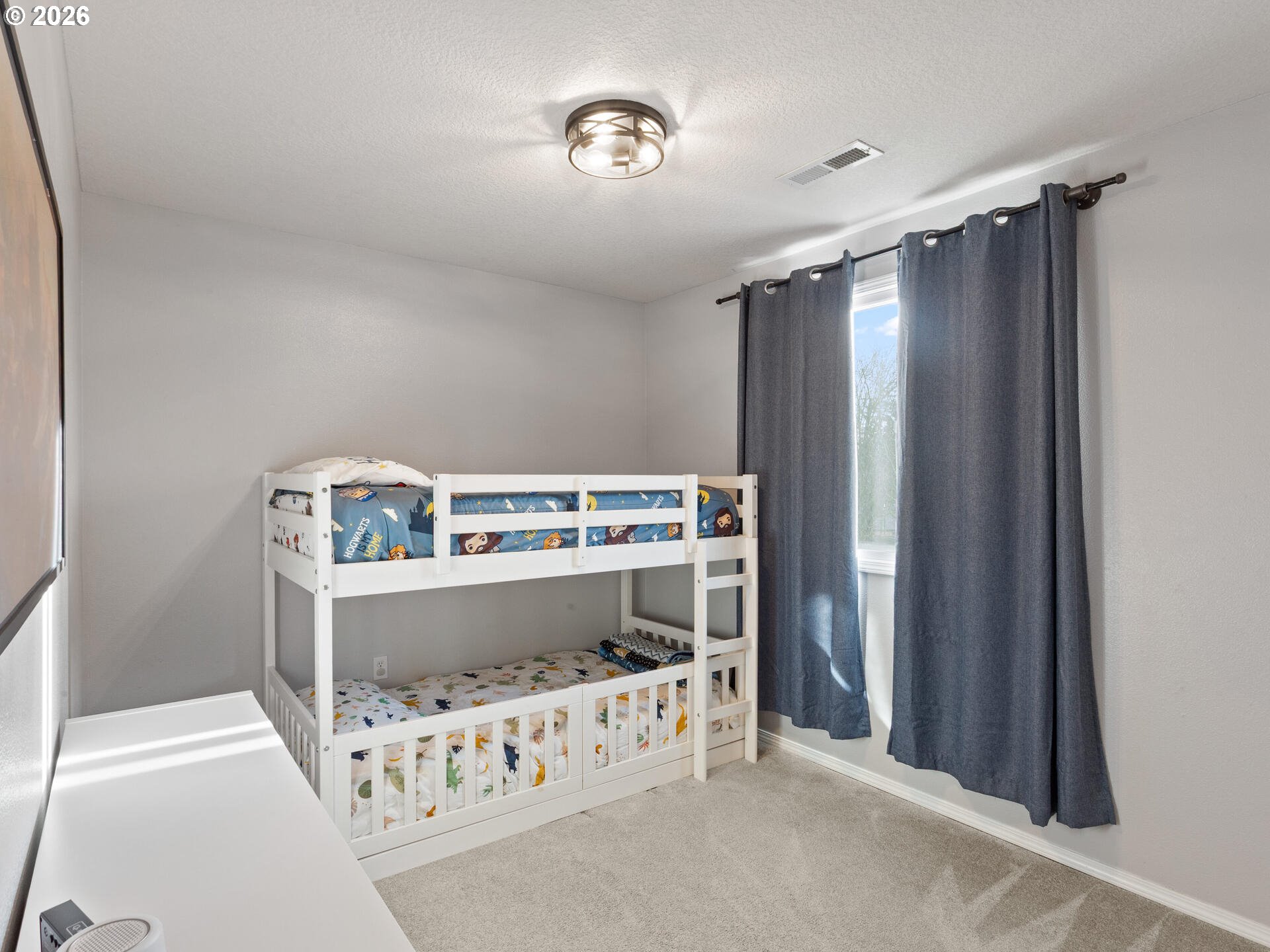 5468 J Street Washougal, WA 98671 - Photo 21 of 48 a bedroom with a bed and a window