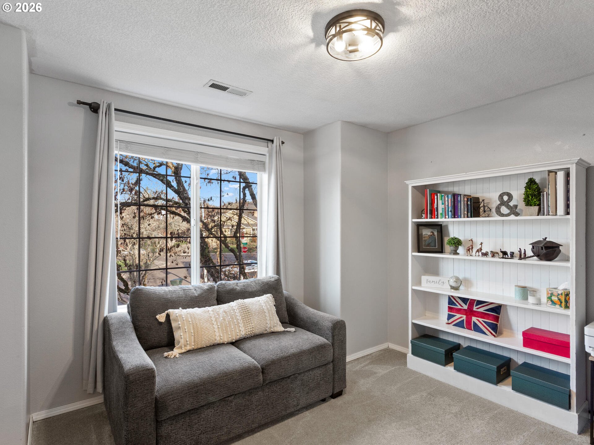 5468 J Street Washougal, WA 98671 - Photo 22 of 48 a living room with furniture and a window