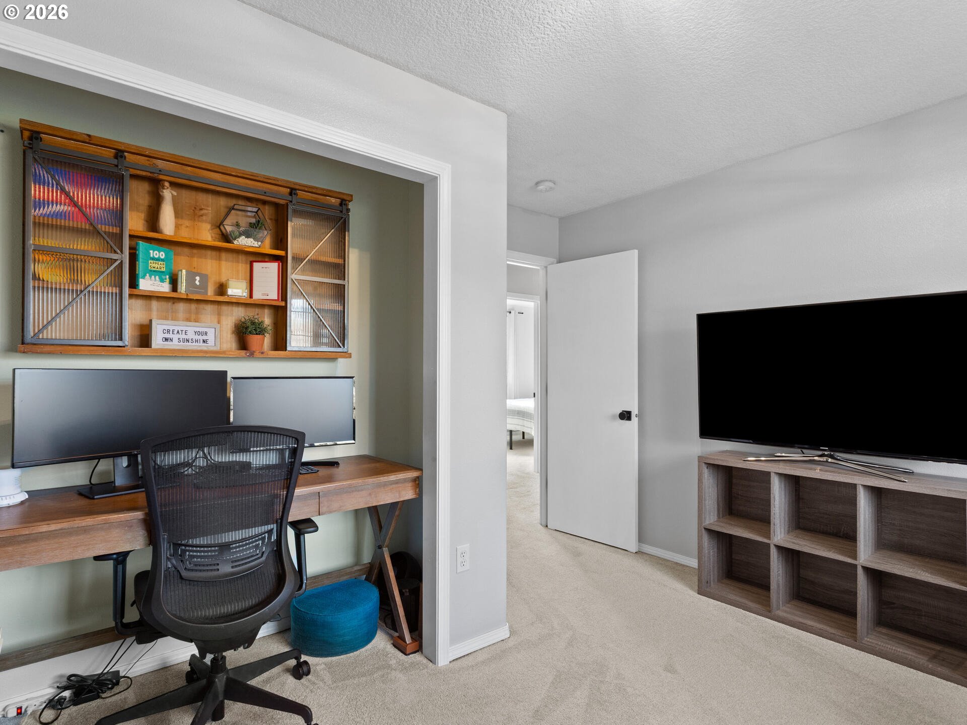 5468 J Street Washougal, WA 98671 - Photo 23 of 48 a view of a workspace with furniture and a window
