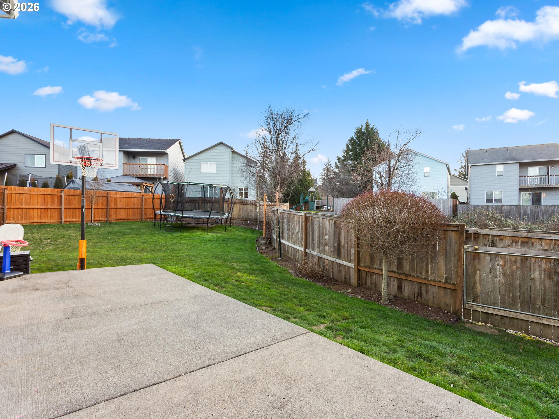 5468 J Street Washougal, WA 98671 - Photo 26 of 48 a view of a house with a yard