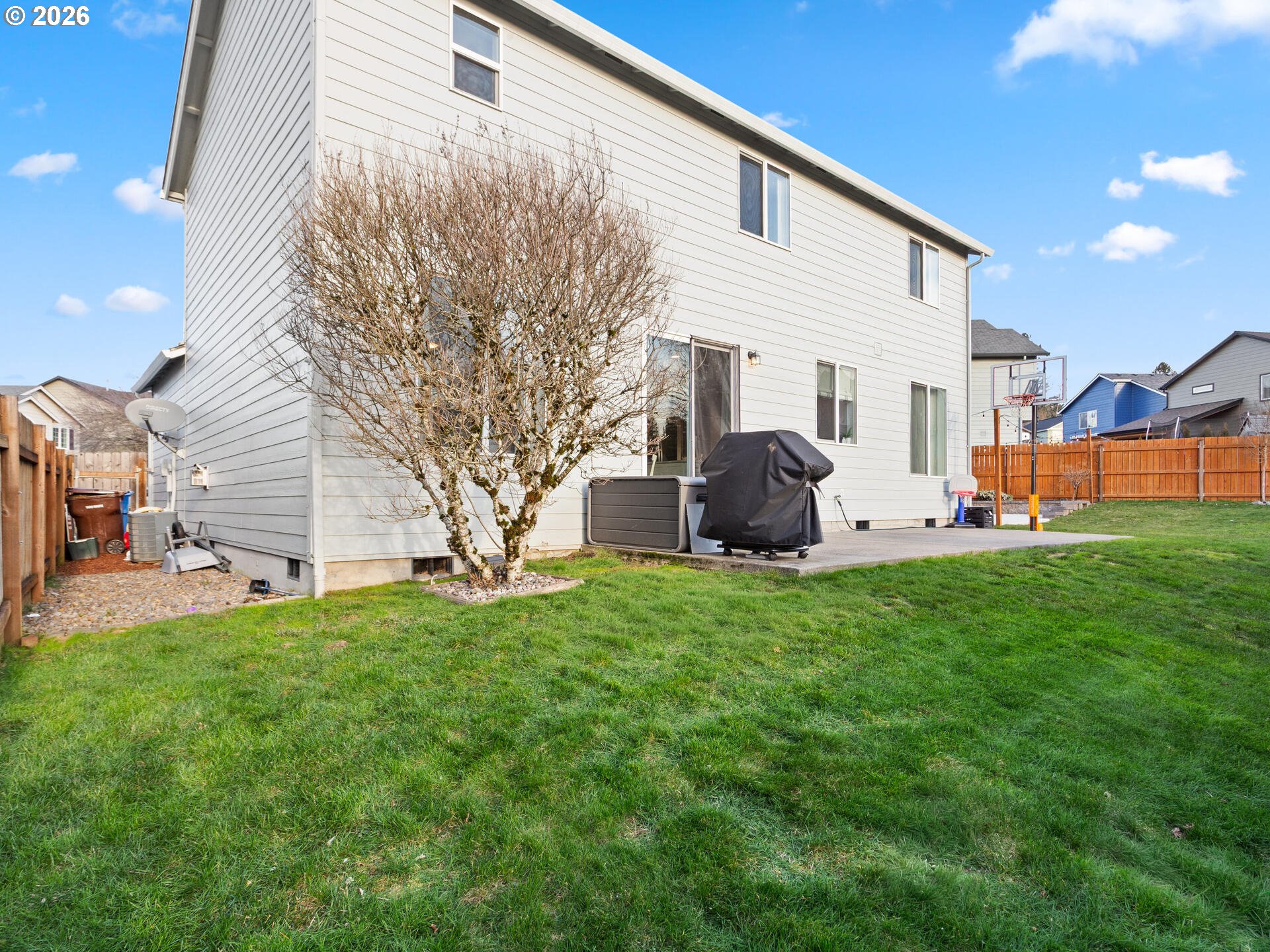 5468 J Street Washougal, WA 98671 - Photo 28 of 48 a backyard of a house with table and chairs