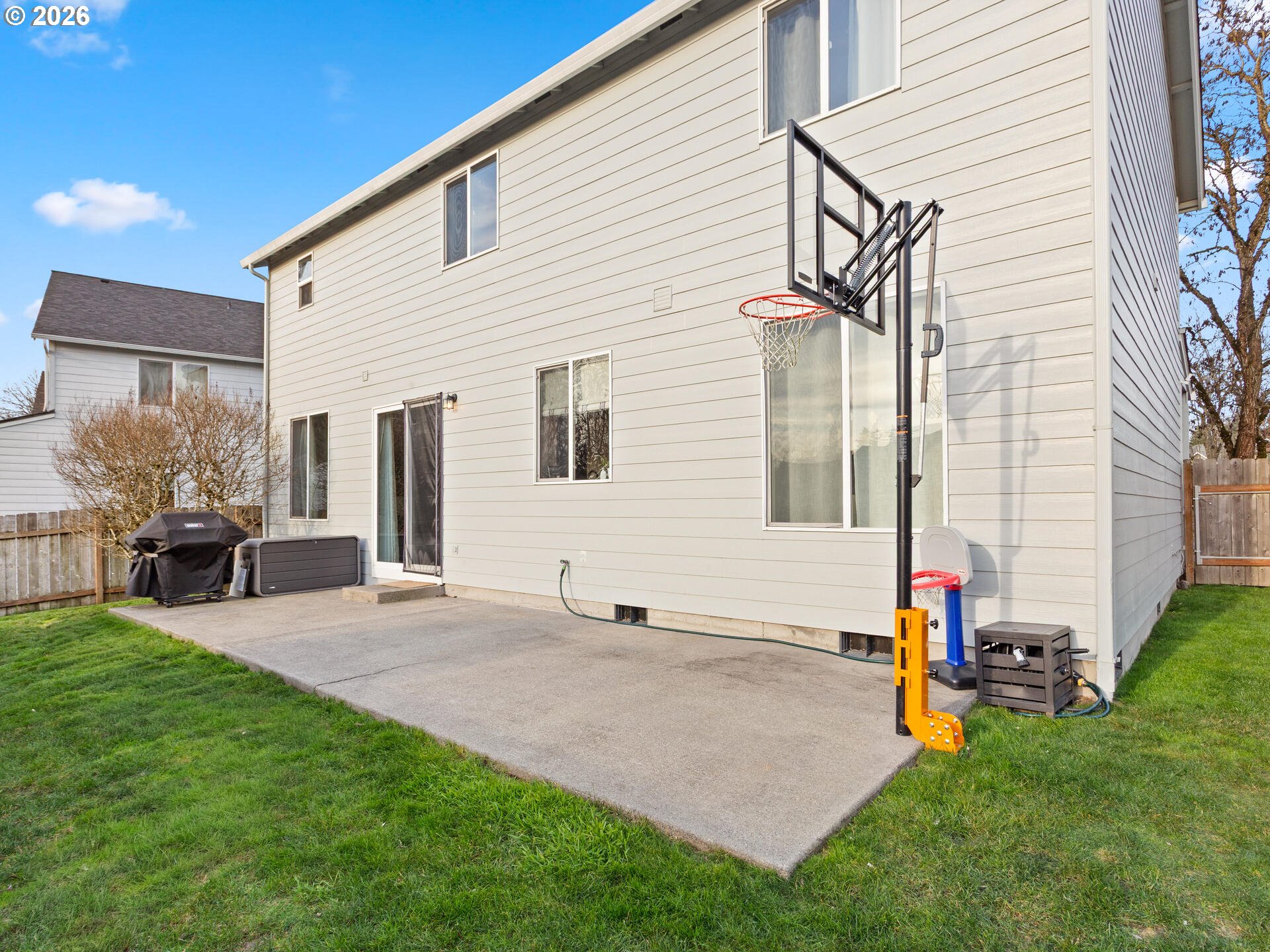5468 J Street Washougal, WA 98671 - Photo 29 of 48 a backyard of a house with table and chairs