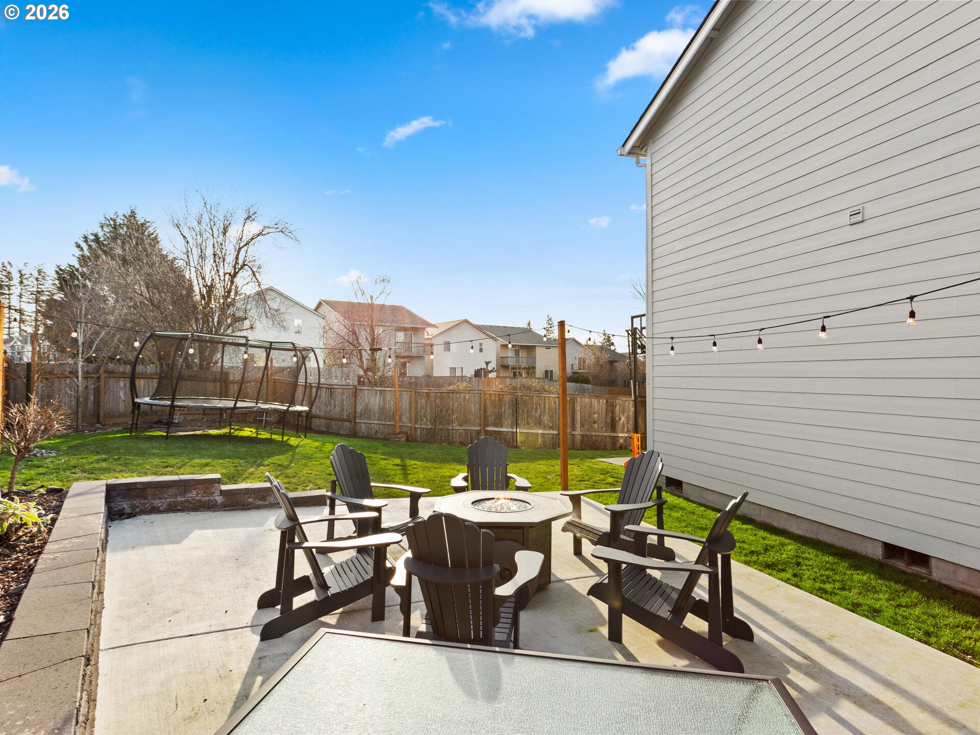 5468 J Street Washougal, WA 98671 - Photo 34 of 48 a view of a patio with a table and chairs