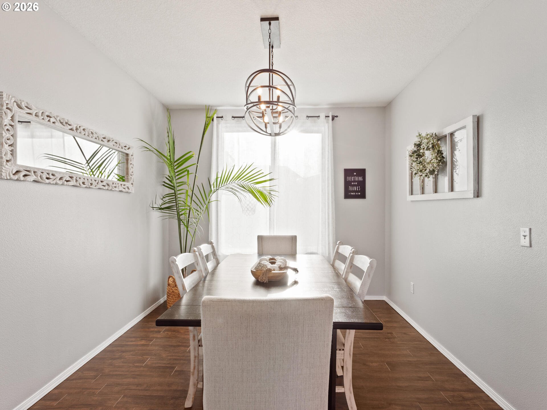 5468 J Street Washougal, WA 98671 - Photo 7 of 48 a view of a dining room with furniture window and wooden floor