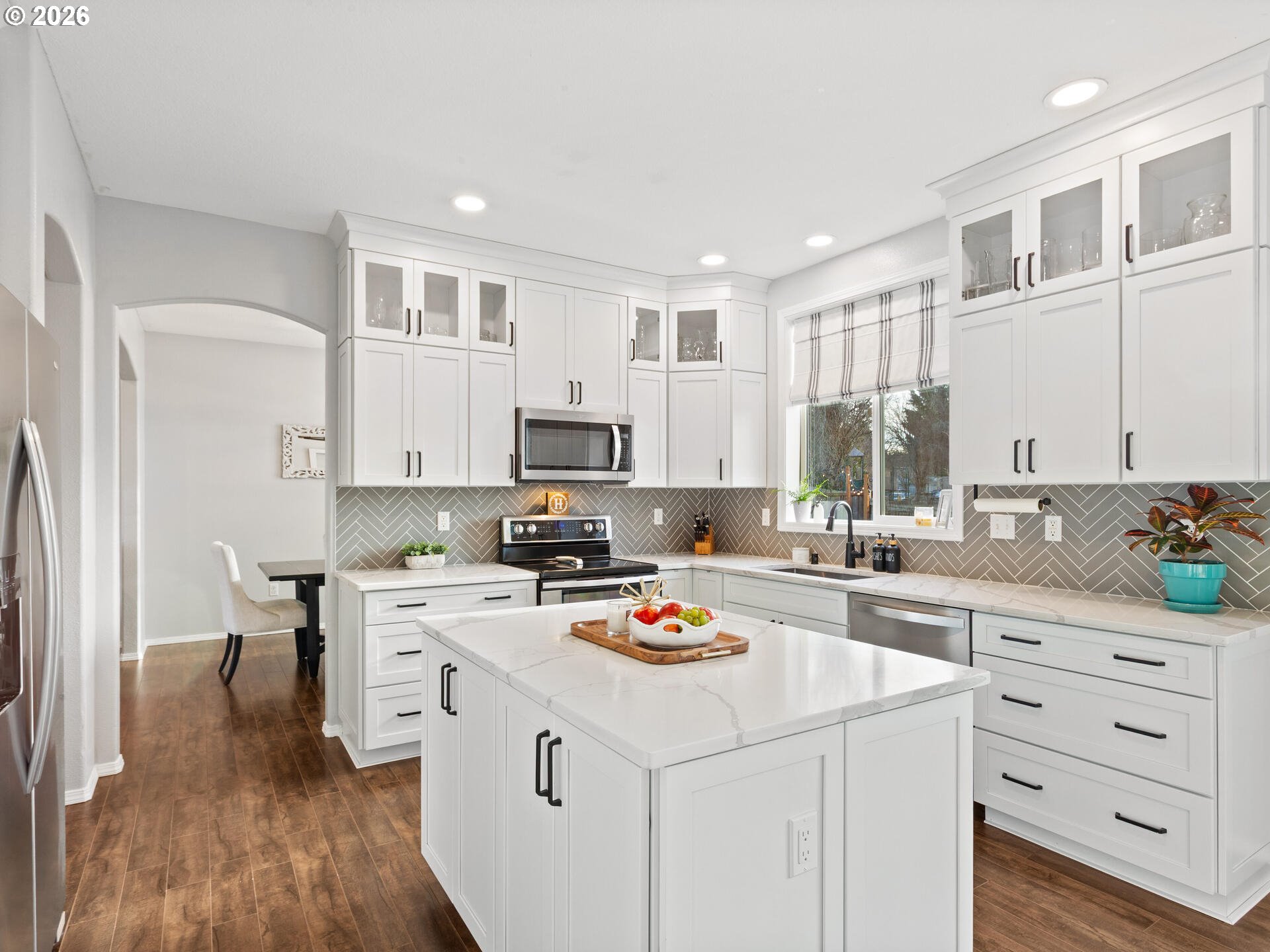 5468 J Street Washougal, WA 98671 - Photo 10 of 48 a kitchen with granite countertop a sink appliances cabinets and furniture