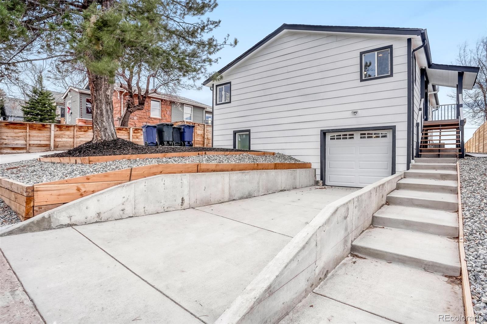 1057 Meade Street Denver, CO 80204 - Photo 1 of 38 a view of a house with a patio