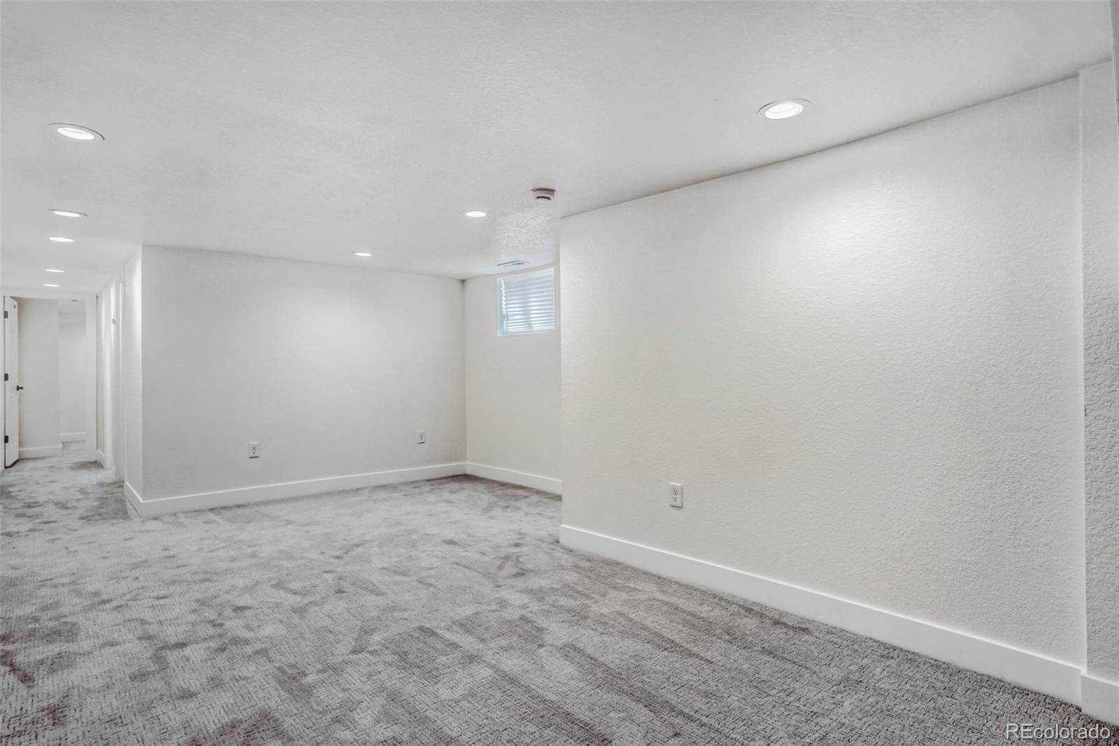1057 Meade Street Denver, CO 80204 - Photo 11 of 38 an empty room with a empty space