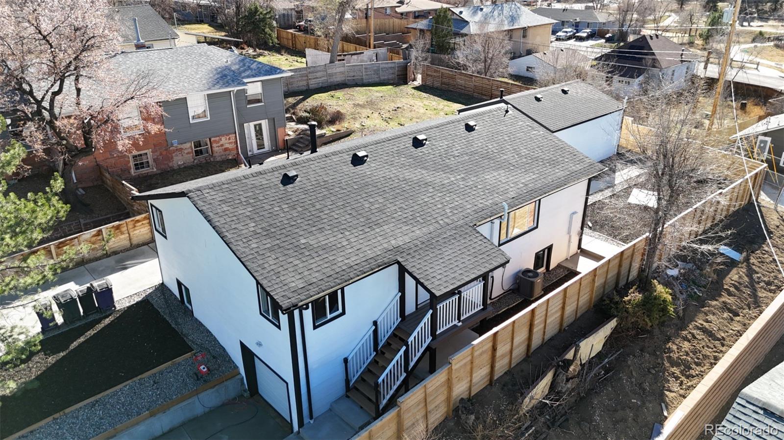 1057 Meade Street Denver, CO 80204 - Photo 2 of 38 an aerial view of a house with roof deck and furniture