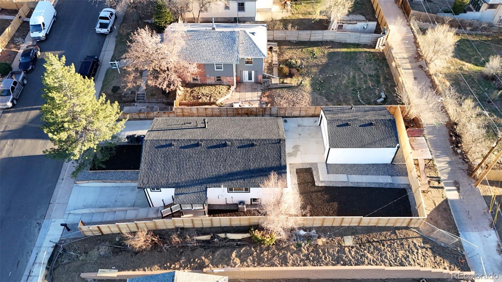1057 Meade Street Denver, CO 80204 - Photo 30 of 38 an aerial view of a house with yard garage and sitting area