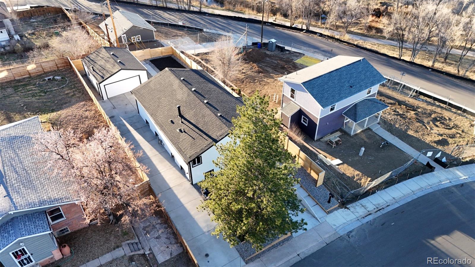 1057 Meade Street Denver, CO 80204 - Photo 3 of 38 an aerial view of a house with a yard