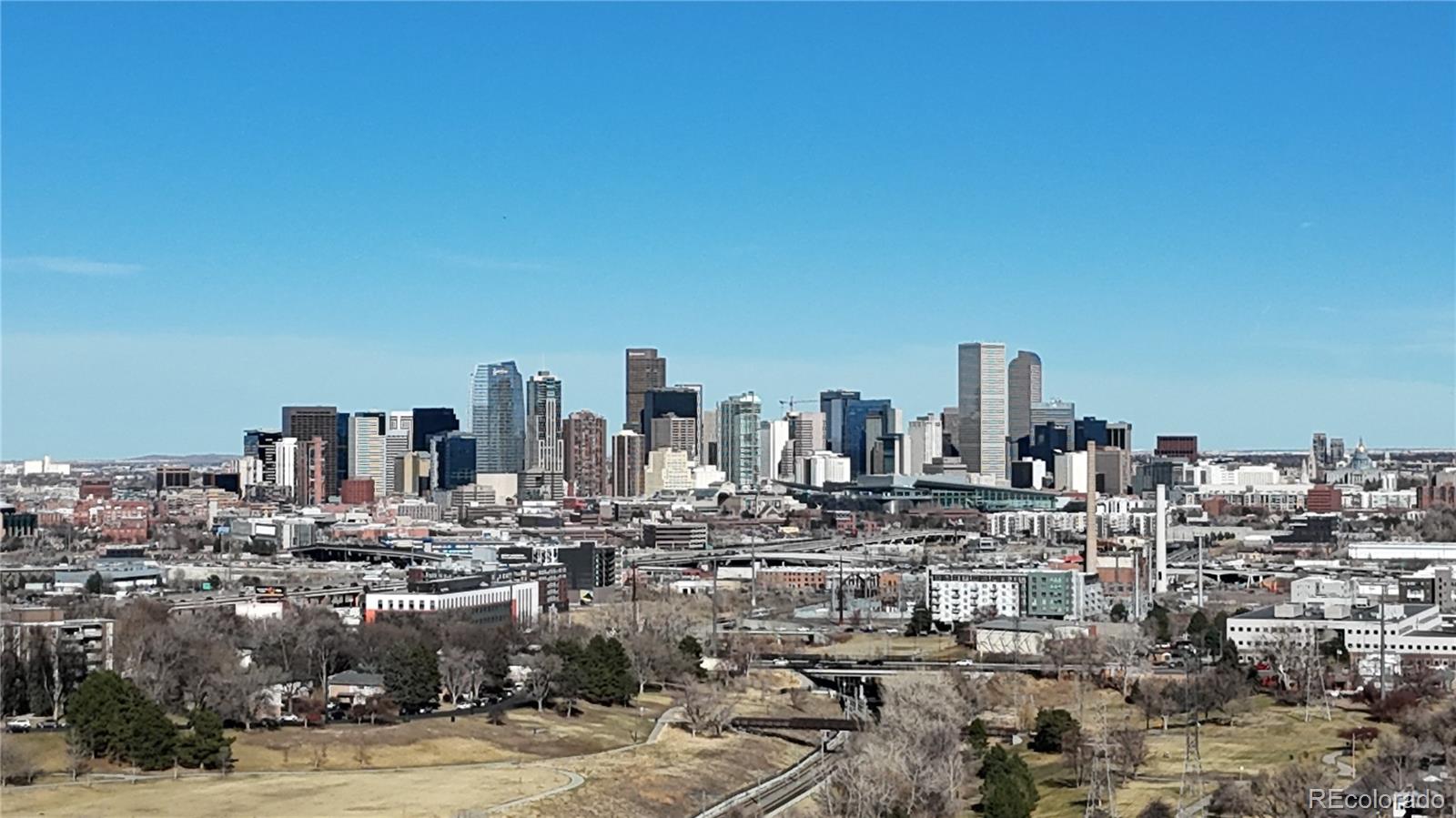 1057 Meade Street Denver, CO 80204 - Photo 32 of 38 a view of a city with tall buildings