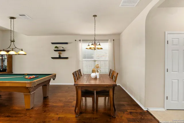 a table and chairs in a room