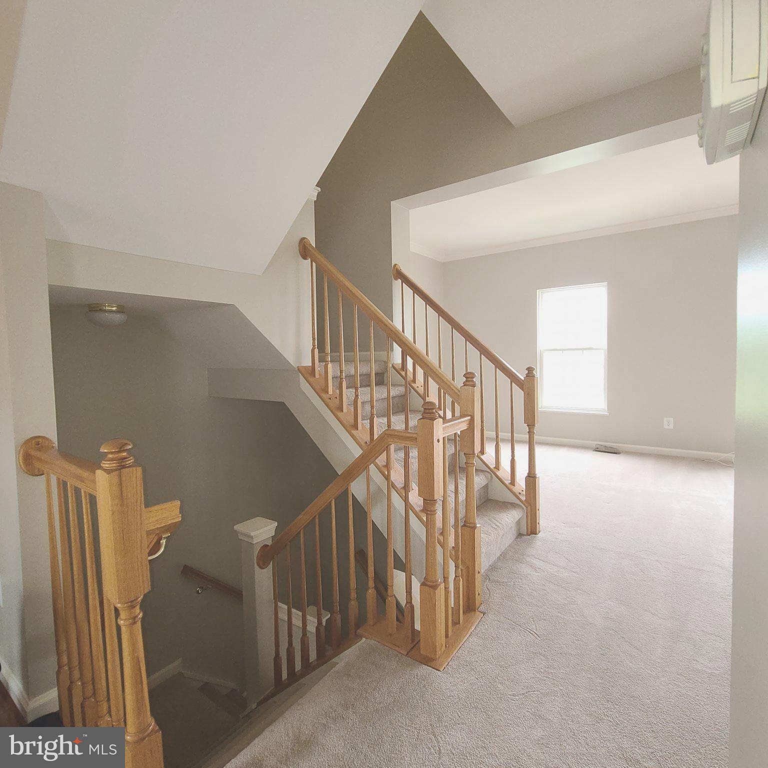 43393 Chokeberry Square Ashburn, VA 20147 - Photo 4 of 31 a view of entryway and hall with wooden floor