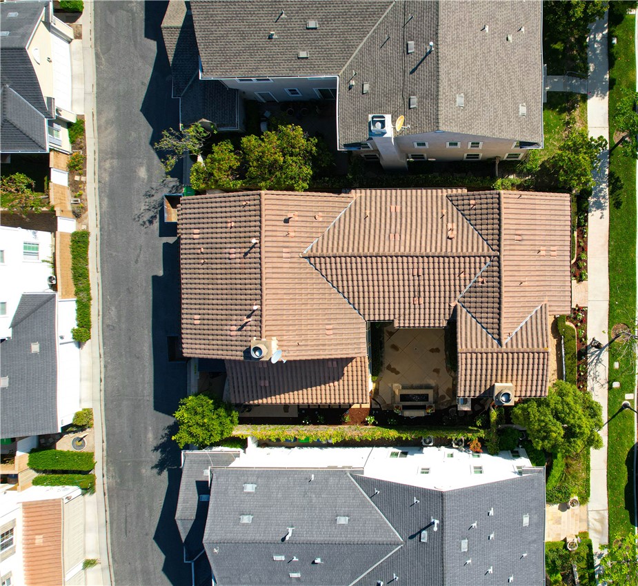 15205 Columbus Square Tustin, CA 92782 - Photo 5 of 43 an aerial view of a house with garden space and street view