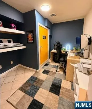 a workspace with furniture and a rug