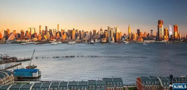 a view of a city with tall buildings