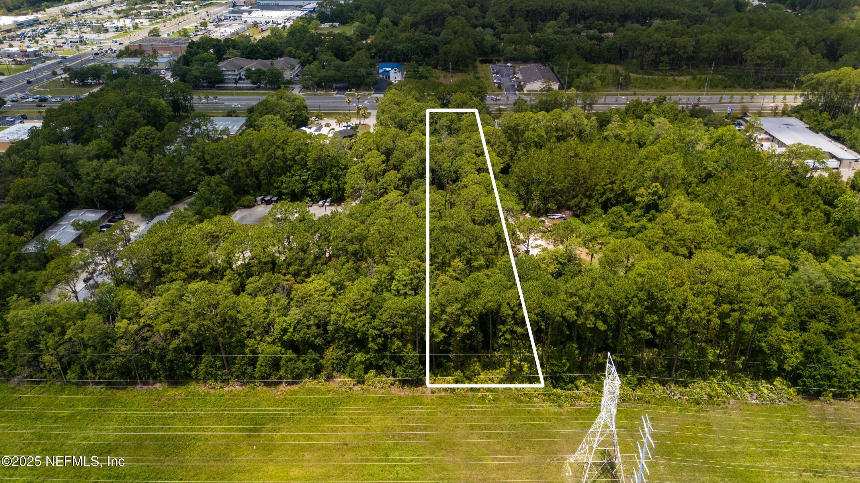 0 St Johns Bluff Road North Jacksonville, FL 32246 - Photo 7 of 12 a view of a swimming pool with a yard