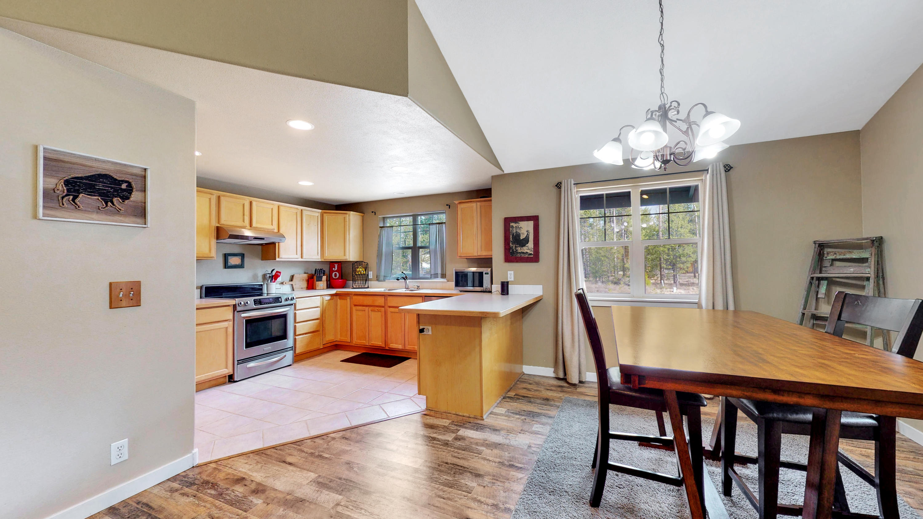 55911 Black Duck Road Bend, OR 97707 - Photo 9 of 24 Dining into Kitchen