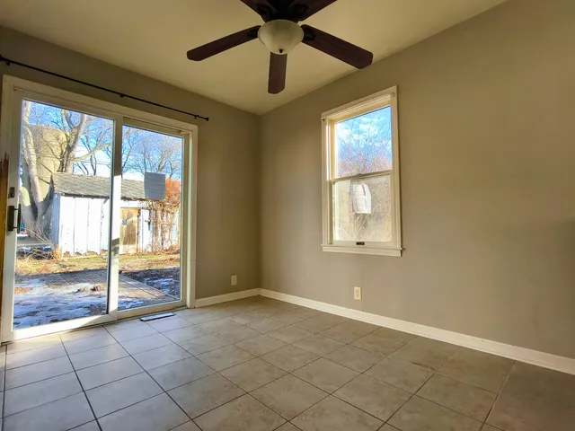 a view of an empty room and window
