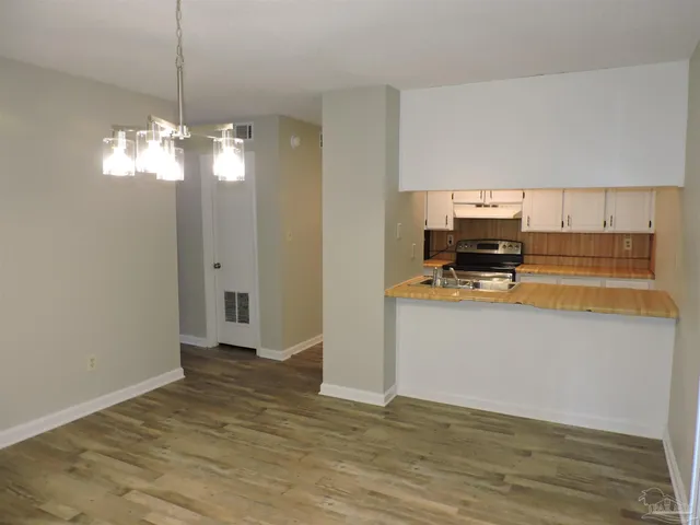 a view of kitchen and microwave