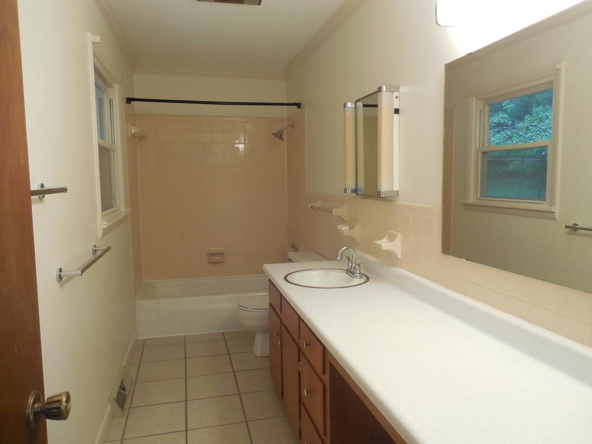 104 Windham Road Oak Ridge, TN 37830 - Photo 13 of 17 a bathroom with a sink and a mirror