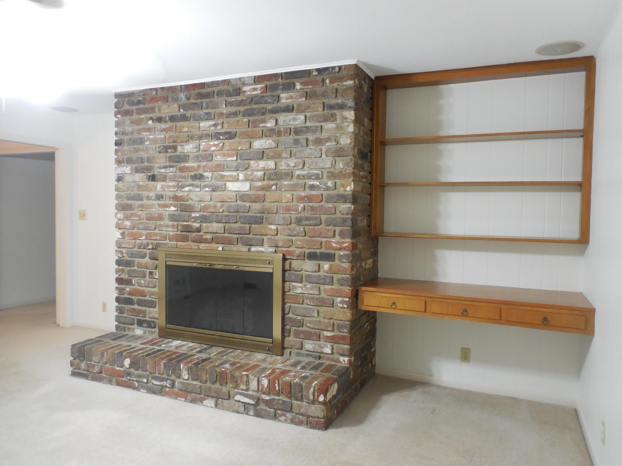 104 Windham Road Oak Ridge, TN 37830 - Photo 4 of 17 a room with a fireplace and a walk in closet