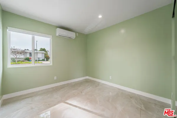 front view of a house with a dry yard