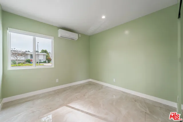 front view of a house with a dry yard