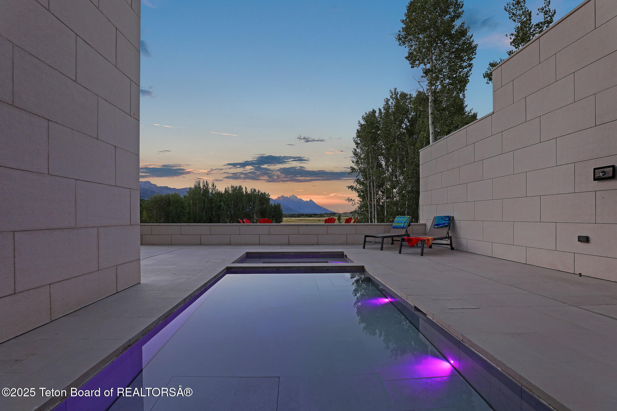 200 North W Ridge Road Jackson, WY 83001 - Photo 2 of 61 Grand Teton views over pool twighlight