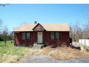 3069 Lyndhurst Road Stuarts Draft, VA 24477 - Photo 1 of 2 a front view of a house with garden