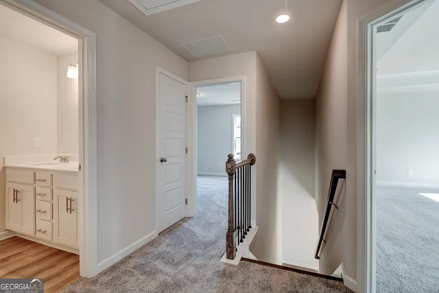 a view of a hallway with closet