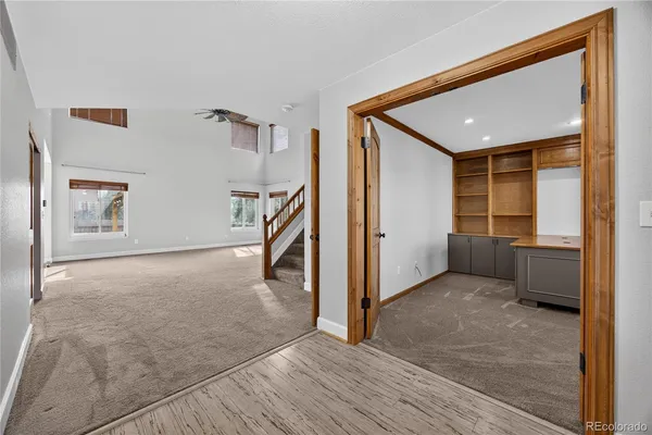 a view of an empty room with a window