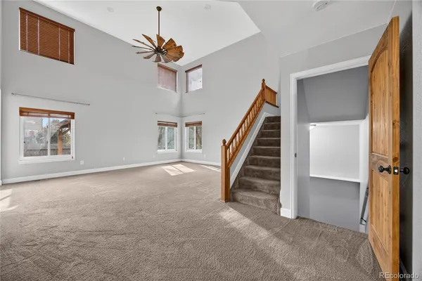 a view of a hallway with staircase