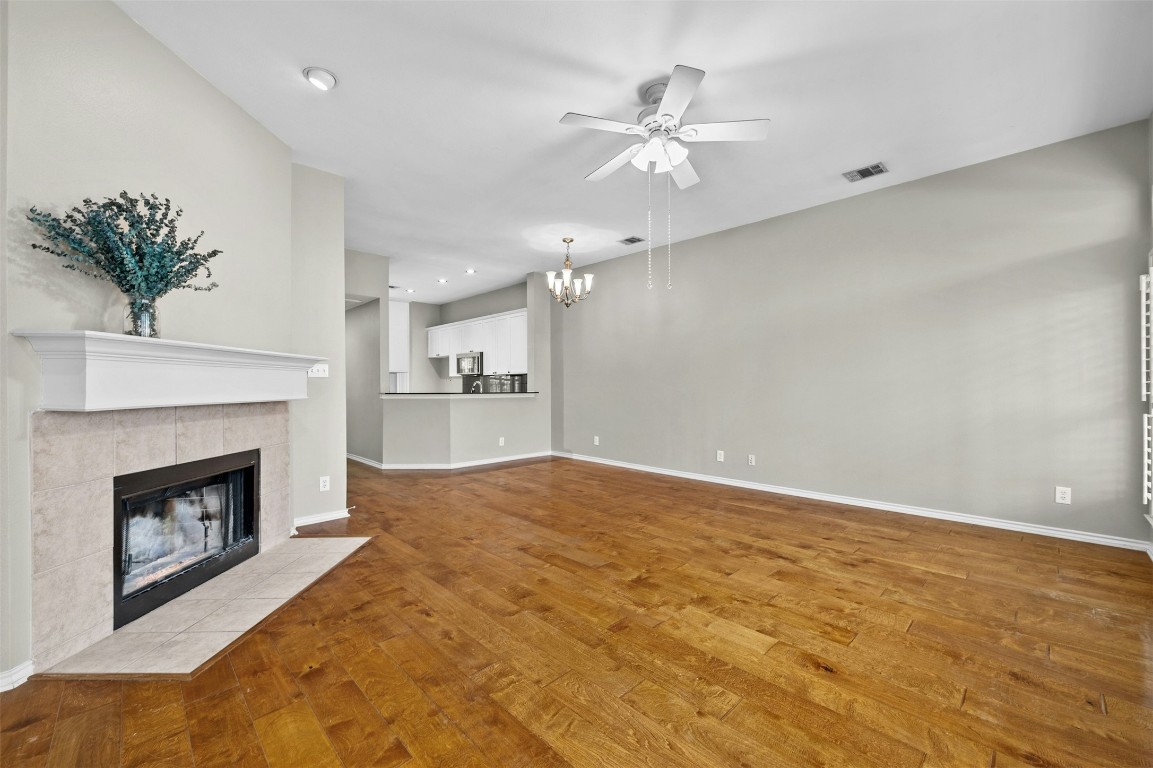 2918 Ranch Road 620 North, Unit W219 Austin, TX 78734 - Photo 18 of 35 a view of an empty room with a fireplace