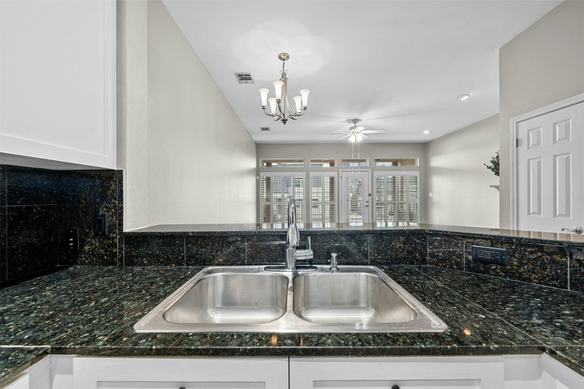 2918 Ranch Road 620 North, Unit W219 Austin, TX 78734 - Photo 10 of 35 a kitchen with a sink and a window