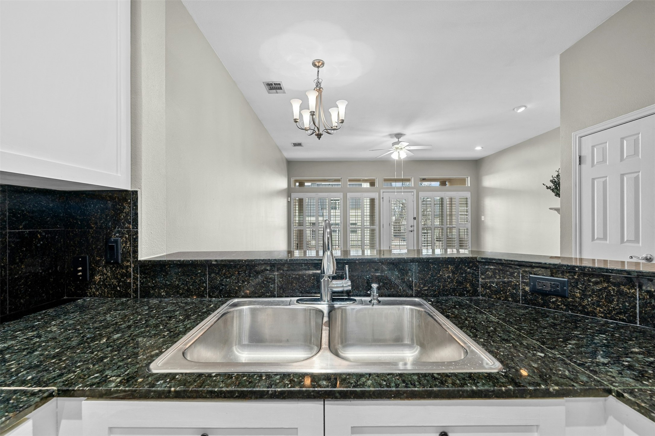 2918 Ranch Road 620 North, Unit W219 Austin, TX 78734 - Photo 10 of 35 a kitchen with a sink and a window