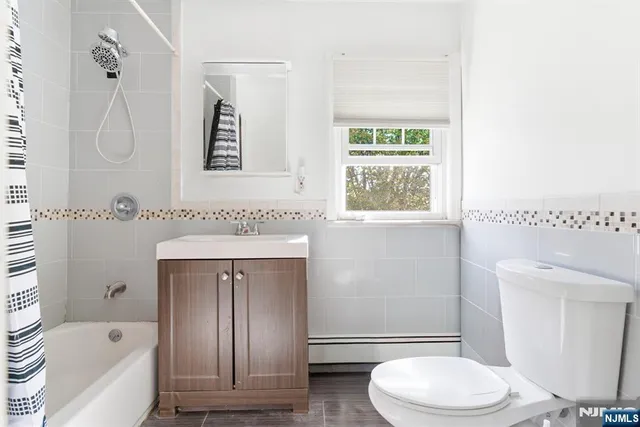 a bedroom with a bed and a table