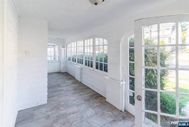 a hallway with windows