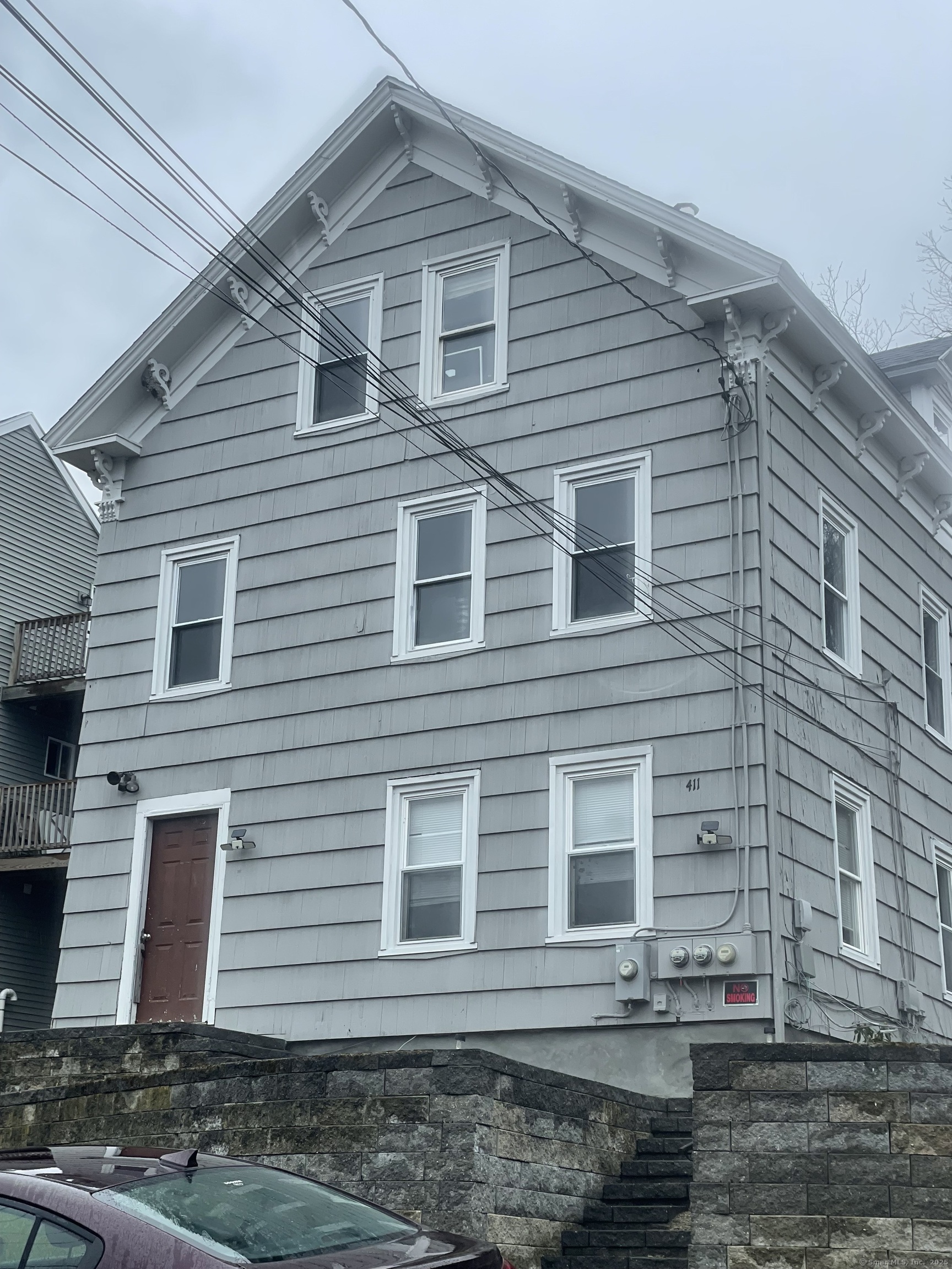 411 School Street Putnam, CT 06260 - Photo 1 of 1 a front view of a house