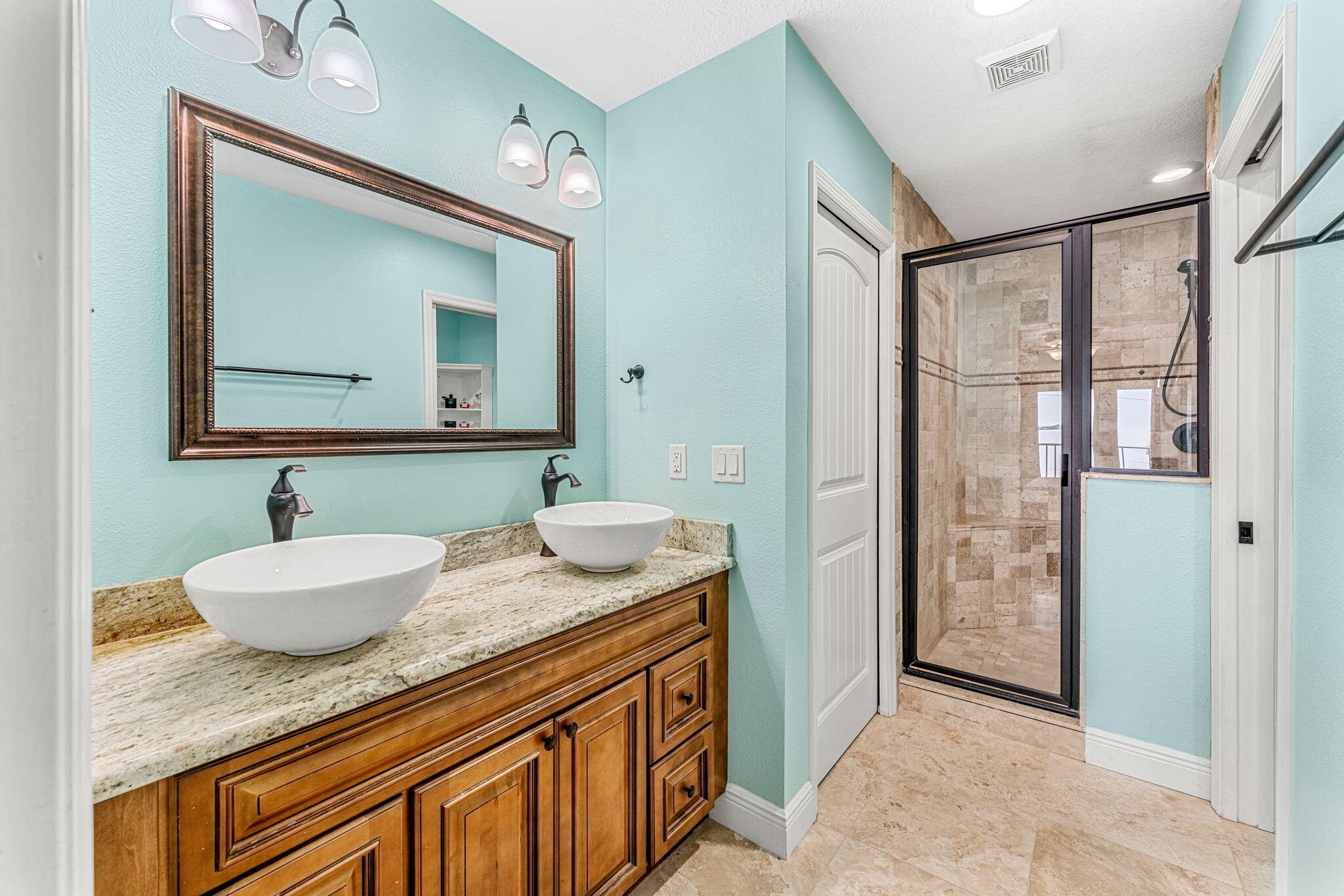 3119 Indian River Drive Cocoa, FL 32922 - Photo 25 of 47 a bathroom with a granite countertop sink mirror and double