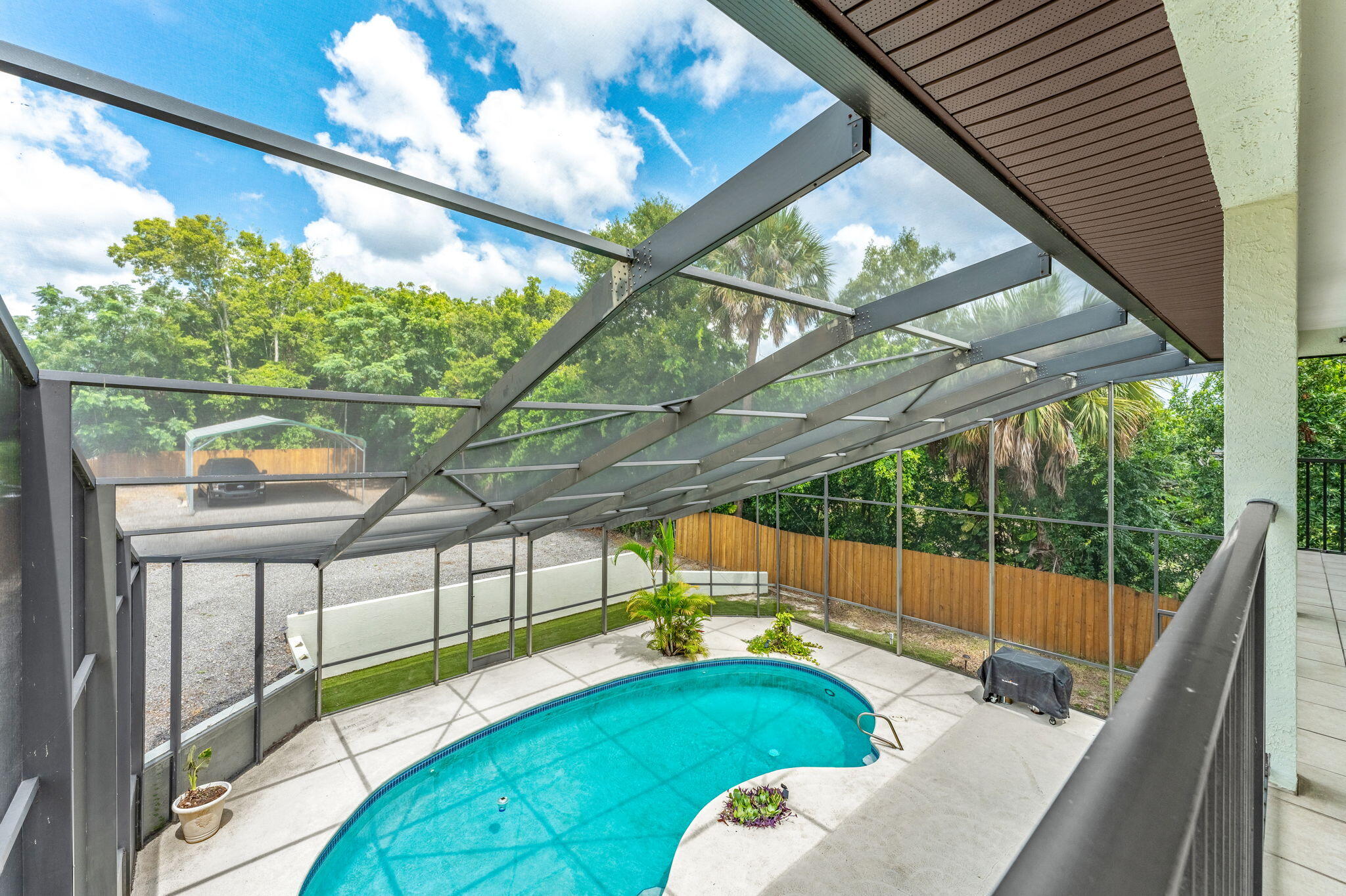 3119 Indian River Drive Cocoa, FL 32922 - Photo 31 of 47 a view of a balcony with chairs