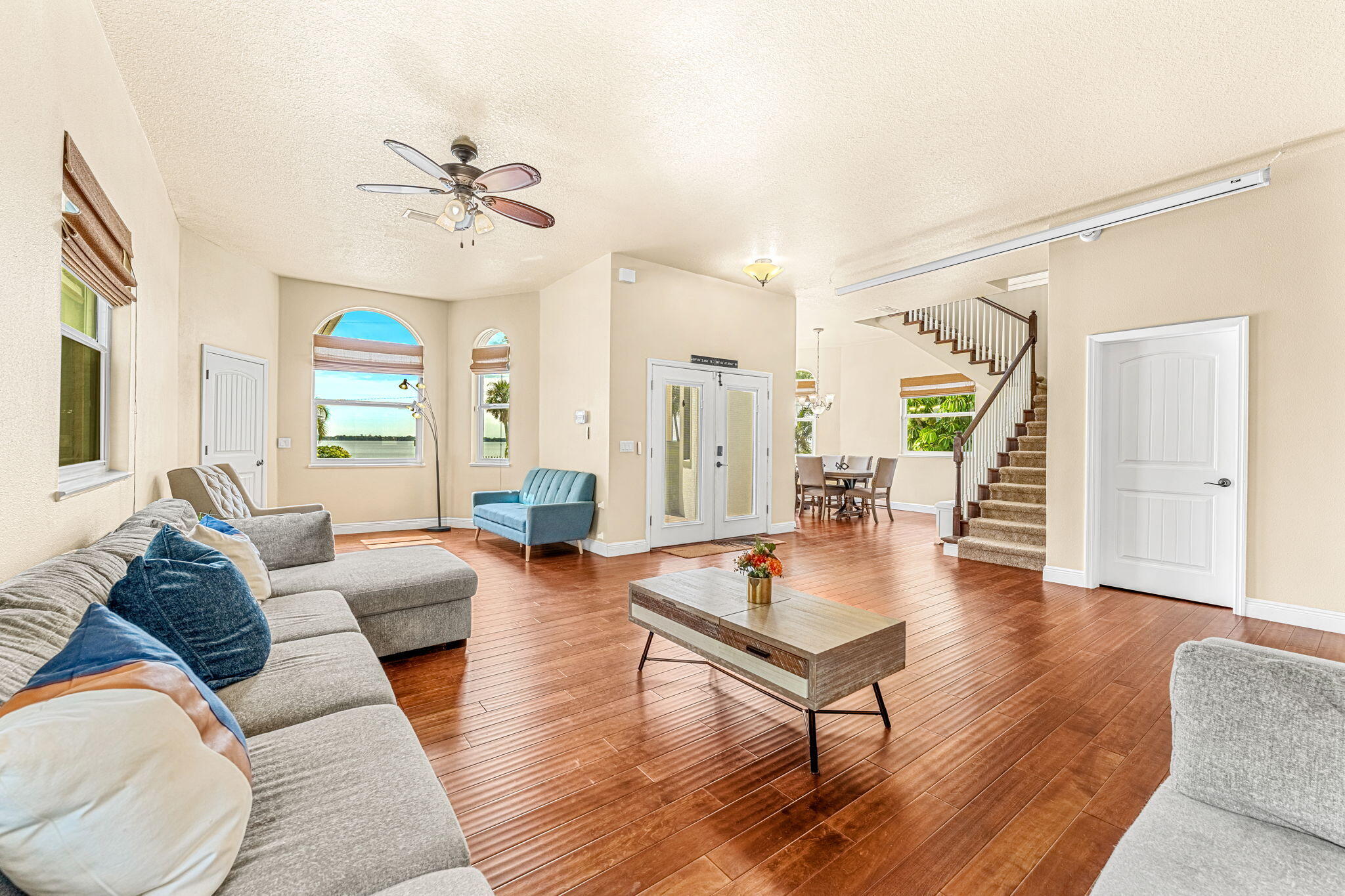 3119 Indian River Drive Cocoa, FL 32922 - Photo 9 of 47 a living room with furniture and wooden floor