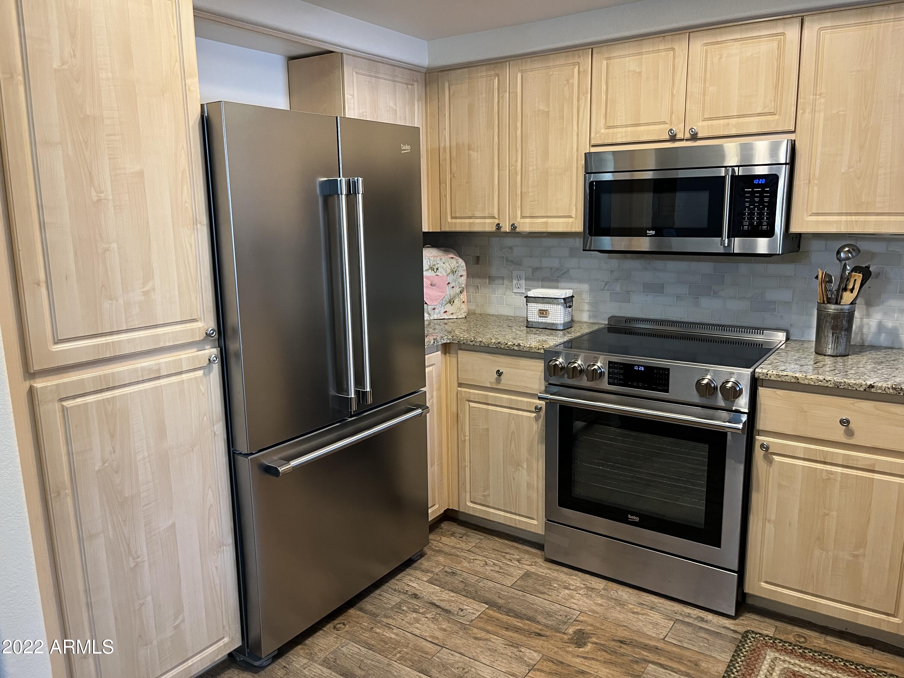 7575 East Indian Bend Road, Unit 1015 Scottsdale, AZ 85250 - Photo 14 of 29 Kitchen Fridge and pantry