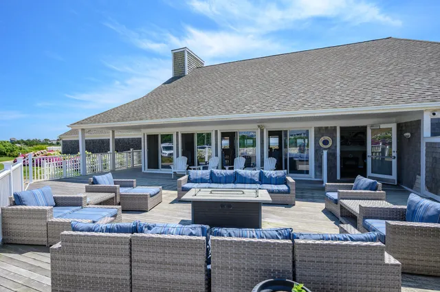 a room with lots of tables a chairs and a table