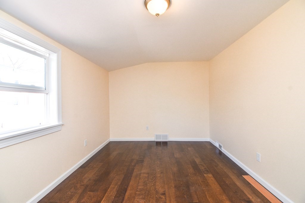 88 Dimmick Street Springfield, MA 01109 - Photo 13 of 36 a view of a small space with wooden floor and a window