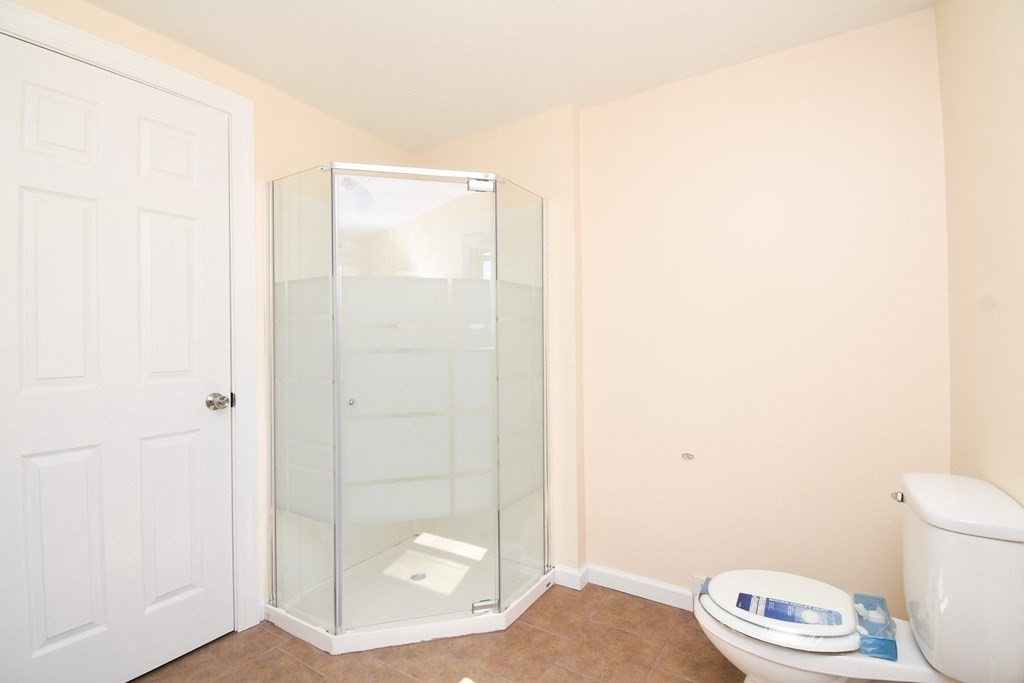 88 Dimmick Street Springfield, MA 01109 - Photo 19 of 36 a bathroom with a toilet and a shower